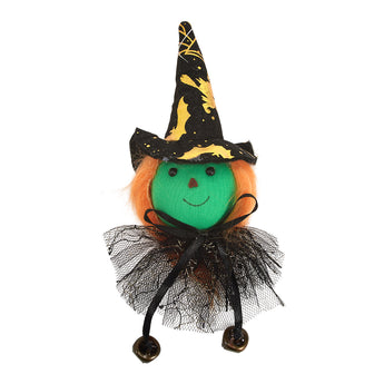 Green-faced witch doll with black-and-gold patterned hat, black tulle skirt and bells