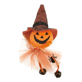 Jack-o’-lantern witch doll with net hat, orange bow and dangling bells