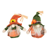 2 faceless gnome dolls side-by-side, orange and green hats, plaid outfits, white beards