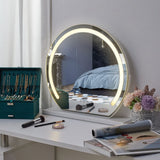 Round makeup mirror with bright LED halo and integrated touch controls