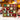 Box of Christmas hanging ball ornaments with red, green striped, gold, and white patterns