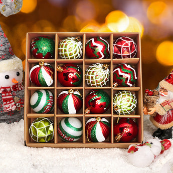 Box of Christmas hanging ball ornaments with red, green striped, gold, and white patterns