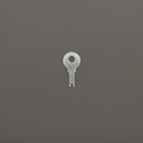 Metal key for the lock on the faux leather double-tier jewellery organizer