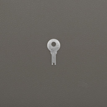 Metal key for the lock on the faux leather double-tier jewellery organizer