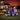 Inflatable grim reaper carriage with purple seat, skull face, pumpkin top, unicorn beside