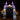 Inflatable haunted castle entrance with lit jack-o'-lantern and flaming torch lights