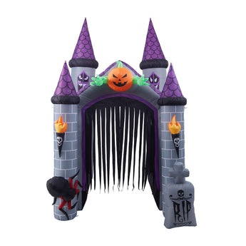 Inflatable haunted castle doorway with striped curtain, purple towers, jack-o'-lantern light