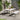 Folding picnic table with two benches, white tabletop and bench seats, black legs