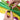 Hands pulling open and securing green, yellow and pink fabric panels of tunnel