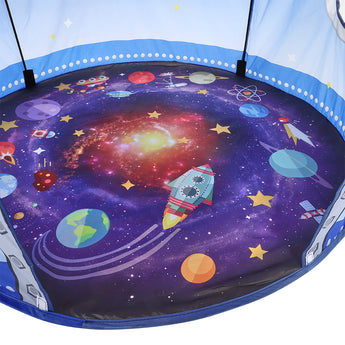 Inside floor of the space-themed pop-up tent with planets, stars, and rocket print