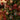 Christmas ball ornaments with red plaid, glittery gold, and patterned green/red designs, hanging loops