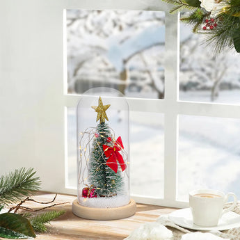 LED glass dome tree decoration with star topper and red bow ribbon