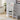 White 5-tier wooden shoe rack, four open shelves and top ledge for shoe storage