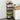 Multi-tier rolling storage trolley with dark shelves and caster wheels, holding jars and produce