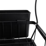 Close-up of black steel dish rack side bin and slotted draining tray