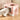 Foldable cat litter box with top entrance cutout, pink body and white bottom tray