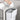 9L white trash can with open lid and front swing handle; bag inside