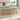 Bamboo shoe storage bench with gray upholstered top and two-tier slatted shelf