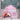 Pink castle play tent with colorful pom-pom roof trim and side window panel