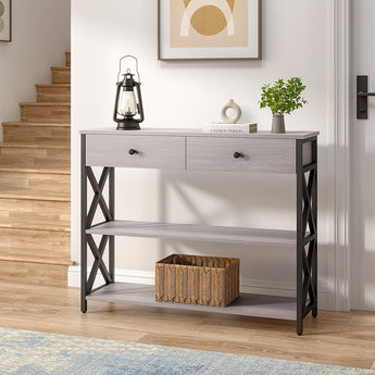 Narrow console table, rustic grey top with two central drawers and black cross-brace legs
