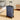 20-inch blue hardside spinner suitcase standing upright with telescoping handle