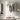White clothes rack with two-tier hanging space and bottom shelf, on casters