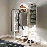 White indoor clothes rack with two hanging bars and lower shoe shelf, rolling wheels