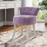 Purple velvet vanity chair with rounded seat, button-tufted back, and white tapered legs