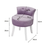 Purple velvet dressing stool chair with curved seat, button-tufted back, and white legs