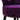 Close-up of dark purple velvet dressing stool with silver stud trim along seat edge