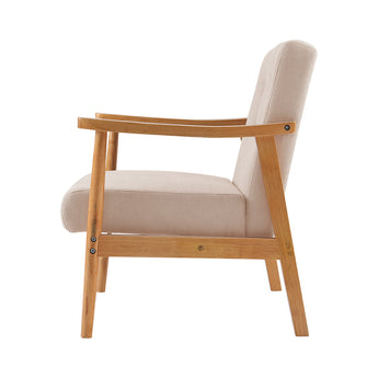 Beige upholstered armchair with curved arms, tufted back, and light wood frame and legs