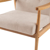 Close-up of beige upholstered armchair seat cushion and armrest with light wood frame