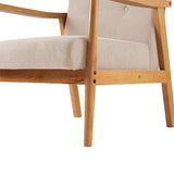 Close-up of beige upholstered armchair armrest, seat edge, and light wood leg