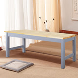 Pine wood bench with light pine tabletop and gray-blue cross-brace ends.