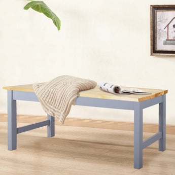 Pine wood bench with light pine seat plank and gray-blue sturdy legs.