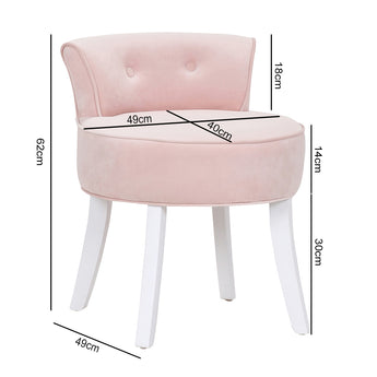 Light pink velvet vanity chair stool with curved seat, button-tufted back, and white legs