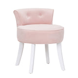 Light pink velvet dressing stool chair with rounded seat, button-tufted back, and white legs