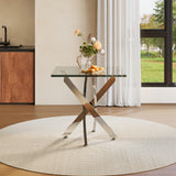 Glass-top metal table with X-frame legs on a round rug, small size