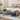 Grey velvet upholstered storage bench with tufted sides and cushioned top