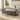 Grey velvet upholstered storage bench with tufted arms and button tufted seat