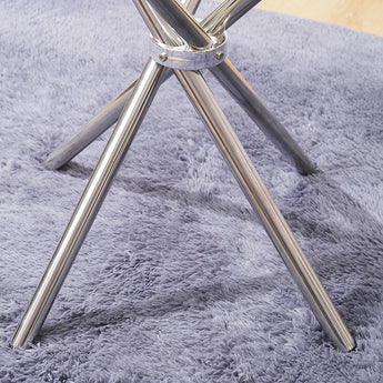 Chrome X-base detail for tempered glass round dining table