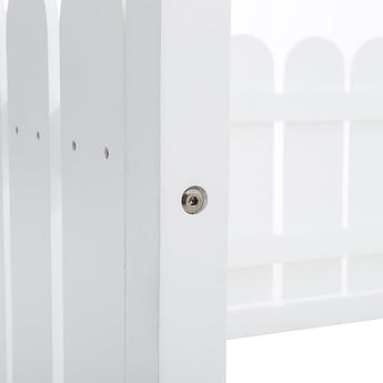 Close-up of white bed frame fence panel with round metal screw head