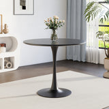 Round dark-finish wooden table with metallic pedestal base