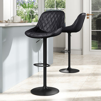 Black faux-leather height-adjustable bar stool, quilted seat and footrest base