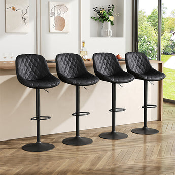 Black quilted faux-leather height-adjustable bar stool with pedestal base and footrest