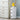 White cylindrical 3-drawer plastic storage unit with three drawer fronts and round pulls