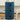 Blue cylindrical 3-drawer plastic storage unit with three drawer fronts and round pulls