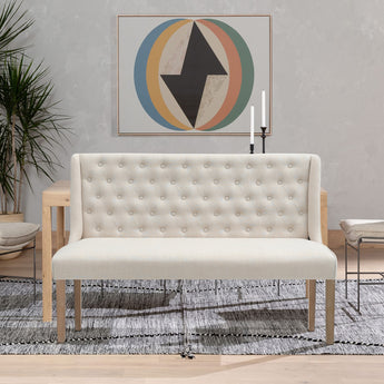 Beige linen dining bench with button-tufted back and arms, square wooden legs