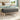 Velvet upholstered storage bench with tufted top in dark gray, wooden legs.