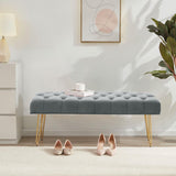 Tufted velvet bench with button detailing, gray upholstery and gold hairpin legs